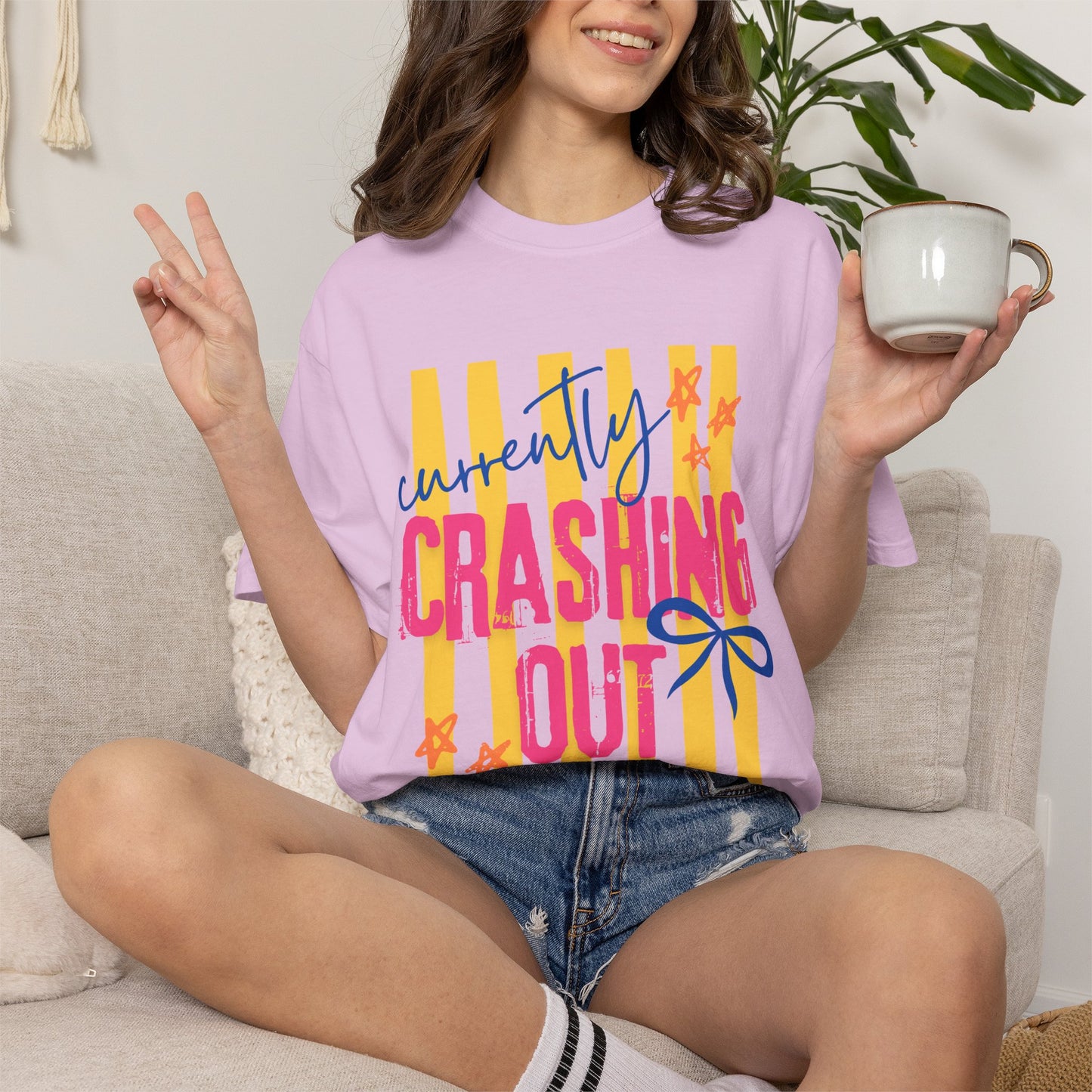 Crashing Out Graphic T‑Shirt — "Currently Crashing Out" Colorful Stripes & Bow Tee