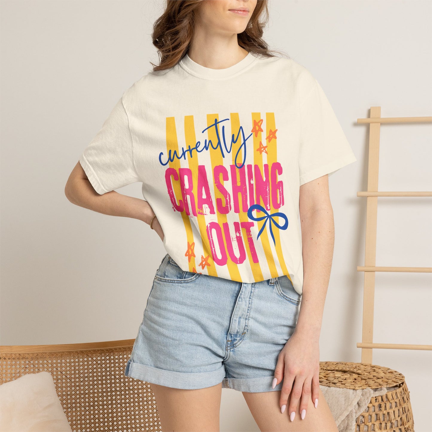 Crashing Out Graphic T‑Shirt — "Currently Crashing Out" Colorful Stripes & Bow Tee