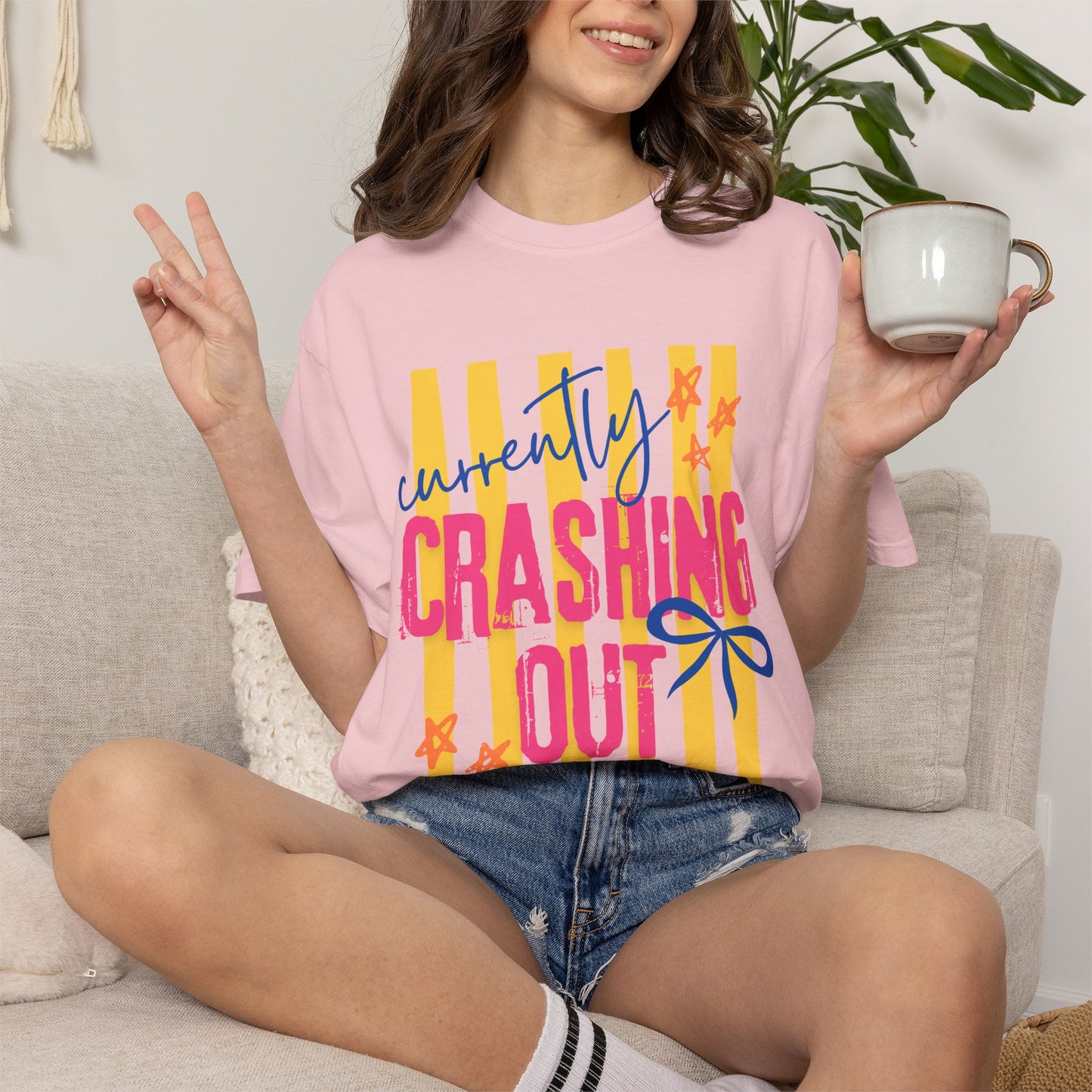 Crashing Out Graphic T‑Shirt — "Currently Crashing Out" Colorful Stripes & Bow Tee