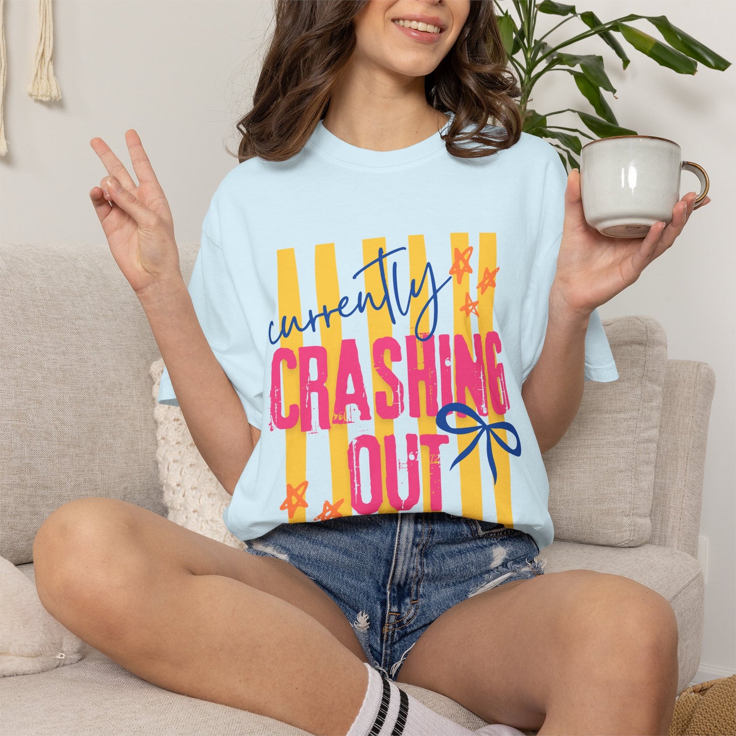 Crashing Out Graphic T‑Shirt — "Currently Crashing Out" Colorful Stripes & Bow Tee