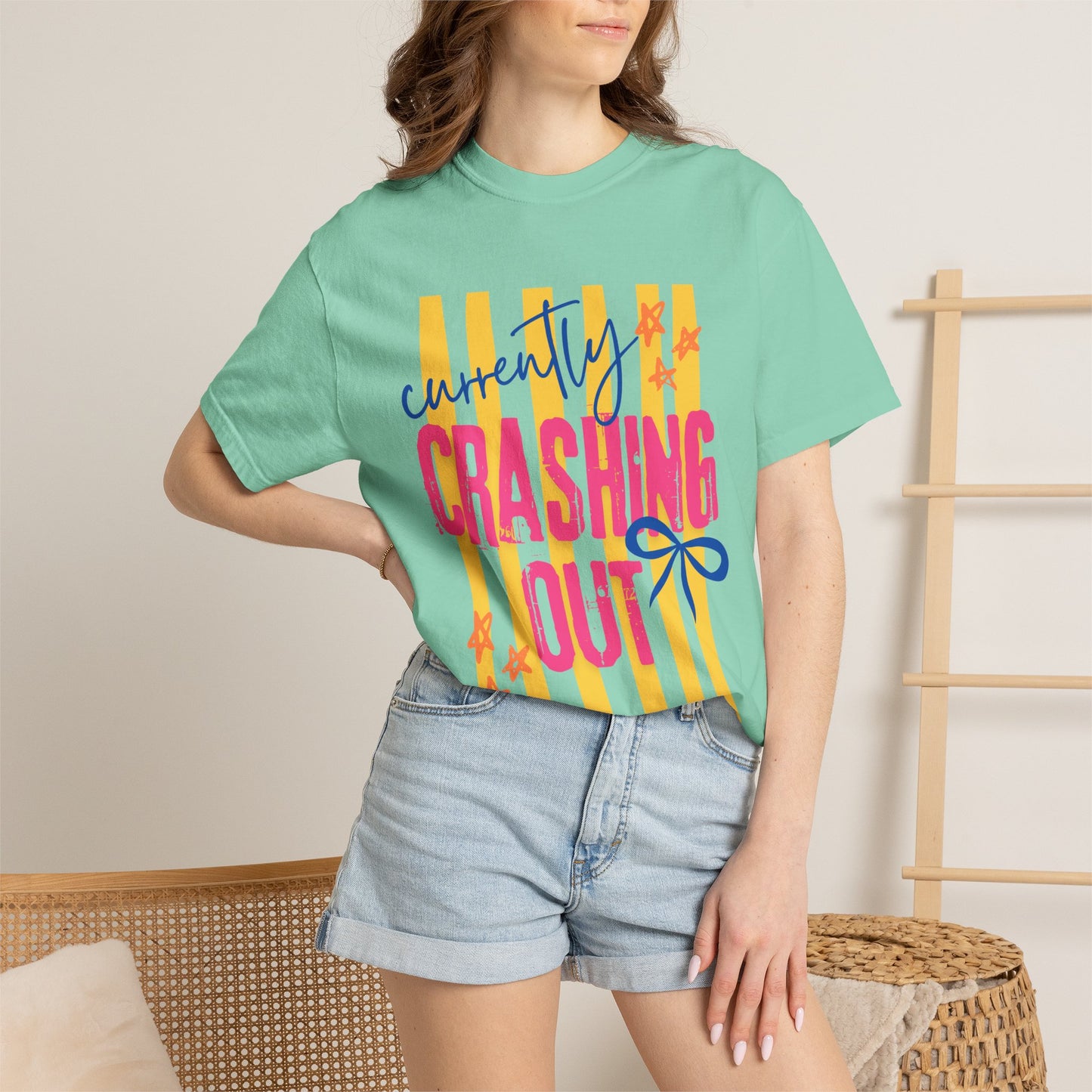 Crashing Out Graphic T‑Shirt — "Currently Crashing Out" Colorful Stripes & Bow Tee